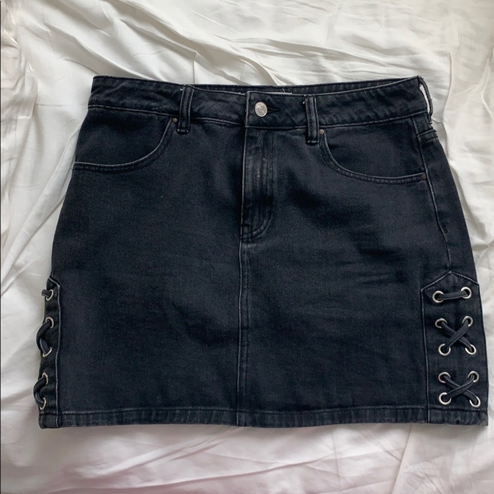 Black jean skirt with side details